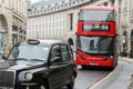 RATP Groups red double decker bus and taxi on Regent Street London Royalty Free Stock Photo