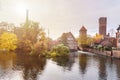 Ratsmuhle or old water mill and Wasserturm or water tower on Ilmenau river in Luneburg. Germany