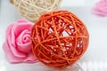 Rattan ball and flower on white Royalty Free Stock Photo