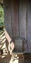 Rattan chair on a wooden floor with sunshine