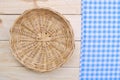 Rattan plate or basket on wooden table