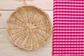 Rattan plate or basket on wooden table