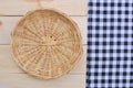 Rattan plate or basket on wooden table