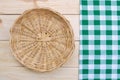 Rattan plate or basket on wooden table