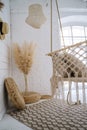 Rattan swings, braided rope swings in the interior