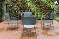 rattan wicker chair and desk on patio Royalty Free Stock Photo