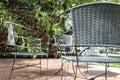 rattan wicker chair and desk on patio Royalty Free Stock Photo