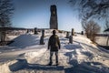 Rattvik - March 30, 2018: Traveler by the King Gustav Vasa memorial runestone in Rattvik, Dalarna, Sweden