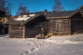 Rattvik - March 30, 2018: Traveler in the wooden houses by the frozen lake Siljan in Rattvik, Dalarna, Sweden