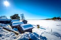 Rattvik - March 30, 2018: Wooden houses by the frozen lake Siljan in Rattvik, Dalarna, Sweden Royalty Free Stock Photo