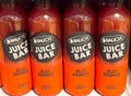 Rauch juice bar blut orange bottles displayed on shelf Royalty Free Stock Photo