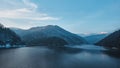 Rausor lake and Iezer Papusa Mountain in winter Royalty Free Stock Photo