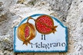 Ravello, Amalfi, Italy - January 5, 2015. Decorative ceramic sign on the old light wall of the house Royalty Free Stock Photo
