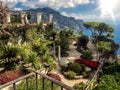 Ravello, Italy, September 7, 2018: Picture postcard with terrace with flowers in the garden Villas Rufolo in Ravello. Amalfi Coast