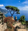 Ravello, Italy, September 7, 2018: Picture postcard with terrace with flowers in the garden Villas Rufolo in Ravello. Amalfi Coast