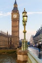 Raven on lampost at Houses of Parliament in early winter morning