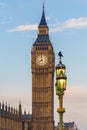 Raven on lampost at Houses of Parliament in early winter morning