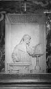 Black and white photo of carved sculpture of Dante Alighieri in his marble tomb in Ravenna Royalty Free Stock Photo