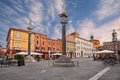 Ravenna, Emilia-Romagna, Italy: the main square Piazza del Popolo with the ancient columns with the statues of Saint Apollinare Royalty Free Stock Photo