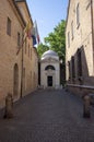 Ravenna / ITALY - June 20, 2018: Dante Alighieri tomb hidden on the end of narrow italian street