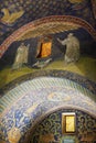 Interior of the Mausoleum of Galla Placidia, chapel embellished with colorful mosaics in Ravenna, Italy.