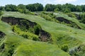 View ravine covered with greenery. Landscape valley with geological faults.