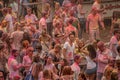 Raving crowd of young people in the Holi Festival, a popular ancient Indian Hindu celebration of colors, life and joy, Magdeburg Royalty Free Stock Photo