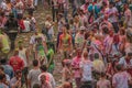 Raving crowd of young people in the Holi Festival, a popular ancient Indian Hindu celebration of colors, life and joy, Magdeburg Royalty Free Stock Photo