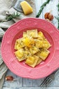 Ravioli with egg yolk, black pepper and parmesan.