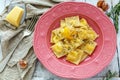 Ravioli with egg yolk, black pepper and parmesan.