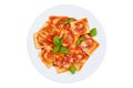Ravioli pasta meal isolated on a white background top view from Italy for lunch dish with tomato sauce on a plate