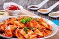 Ravioli with tomato sauce and basil leaves Royalty Free Stock Photo