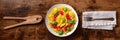 Ravioli with tomato sauce and basil on a plate, overhead flat lay panorama Royalty Free Stock Photo