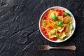 Ravioli with tomato sauce and fresh basil, Italian dumplings, top shot Royalty Free Stock Photo