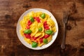 Ravioli with tomato sauce and fresh basil on a plate, shot from the top Royalty Free Stock Photo