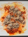 Ravioli With Tomato Sauce, A Pile Of Food With Skulls And Sauce