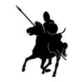 Silhouette of an ancient cavalry soldier warrior ride a horse carrying spear and shield weapon wearing war armor. Royalty Free Stock Photo