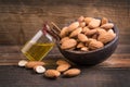 Raw almonds and oil Royalty Free Stock Photo