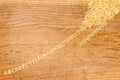 Raw alphabet pasta on cutting board lined up from heap Royalty Free Stock Photo