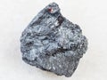 raw antimony ore (Stibnite) stone on white