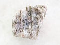 raw Apatite ( ore of phosphorus) stone on white