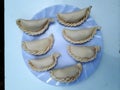 Raw Argentine empanadas, ready to go into the oven