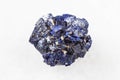 Raw Azurite mineral crystals on white marble Royalty Free Stock Photo