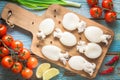 Raw babies cuttlefish on a cutting board Royalty Free Stock Photo