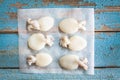 Raw babies cuttlefish on rustic background Royalty Free Stock Photo