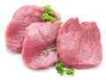 Raw beaf steaks with parsley on a white background.