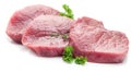 Raw beaf steaks with parsley on a white. Royalty Free Stock Photo