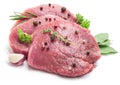 Raw beaf steaks with spices. Royalty Free Stock Photo