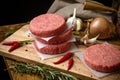 Raw beef burger, traditional barbecue, still life with vegetables and meat Royalty Free Stock Photo