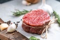 Raw beef filet Mignon steak on a wooden Board Royalty Free Stock Photo